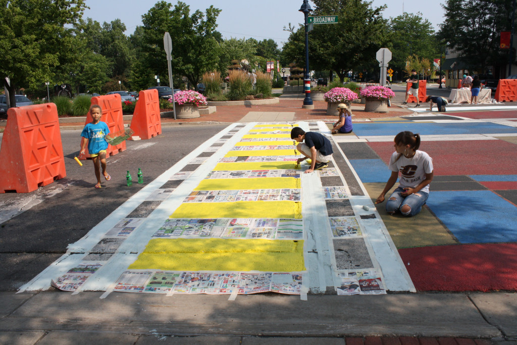 Painting a crosswalk in Mount Pleasant, Michigan. Flickr photo by anneheathen. /photos/annethelibrarian/14866121011